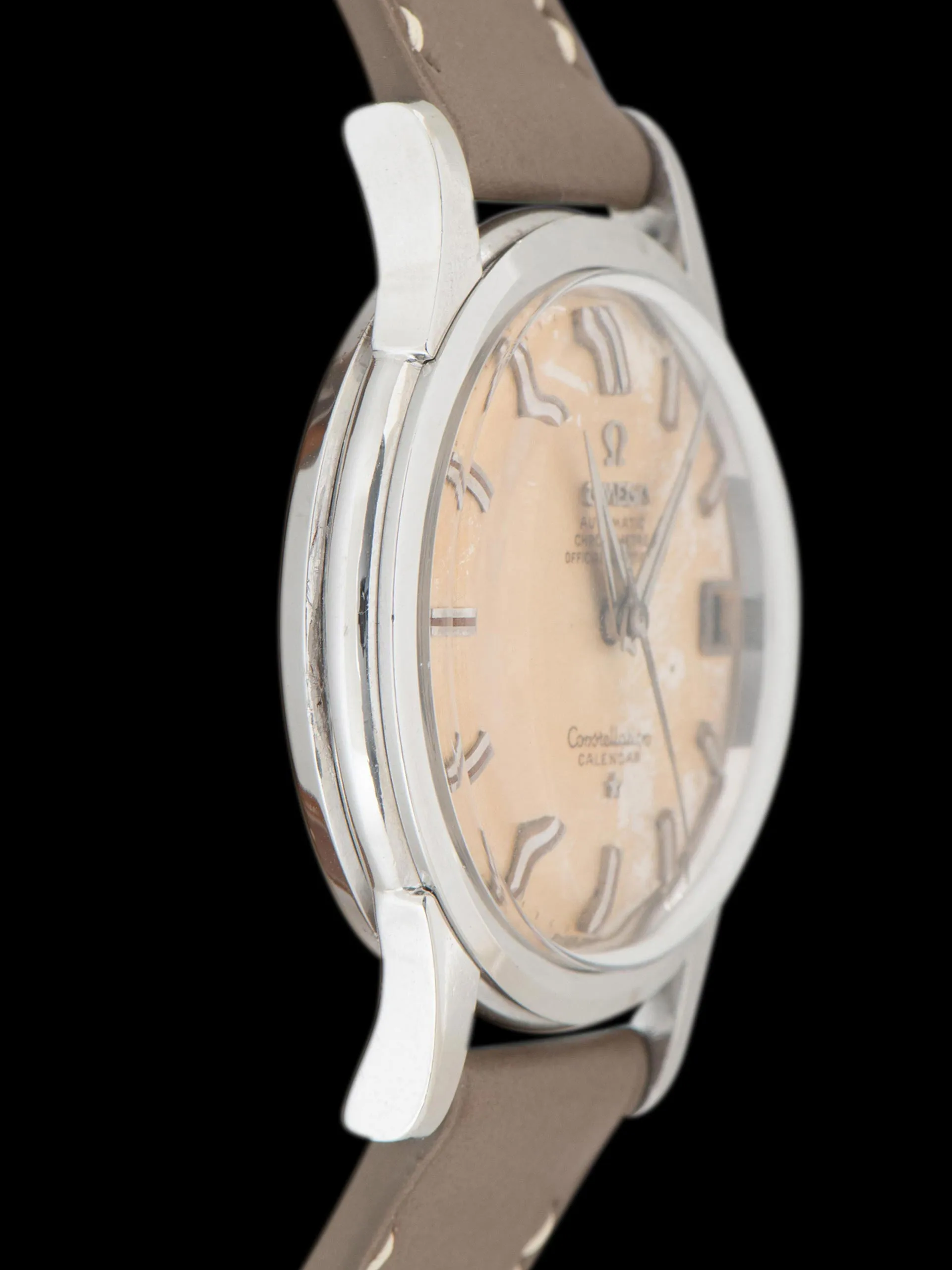 Sure! The optimized title for this e-commerce product in English with modifiers could be: Vintage 1958 Tropical Omega Constellation Calendar Watch (Ref. 2943 2 SC) - Rare Luxury Timepiece